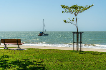 near the beautiful beach of Agnes Water in Australia there is a catamaran at anchor