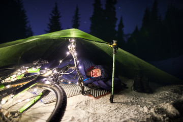 Man sleeping in tent at winter © pikoso.kz