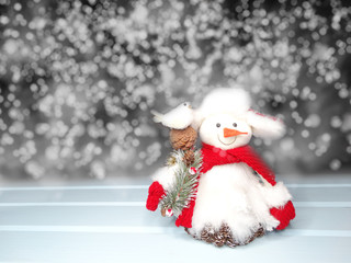 winter background with snowman decor and snow