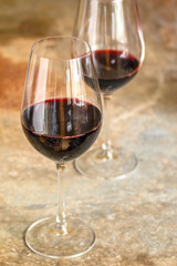 red wine drinking glass (delicious alcoholic drink, holiday) menu concept. food background. top view. copy space