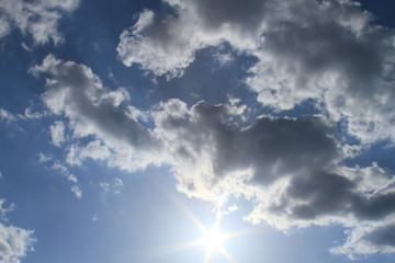 Fototapeta na wymiar Sun through the Clouds