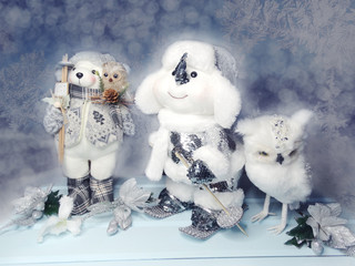 winter background with snowman bear owl bird decor and snow