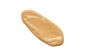 Liquid foundation smear smudge swatch isolated on white background. Beige concealer, color corrector stroke. Face makeup cream texture