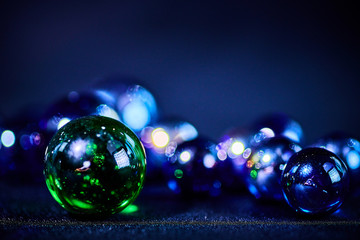 Christmas New Year bright bokeh abstract background of glass balls