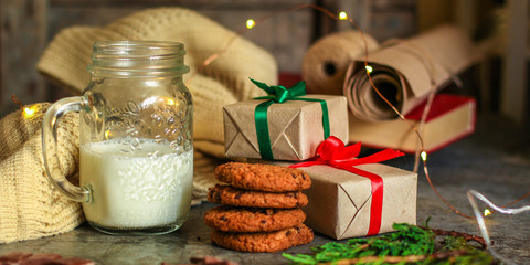 milk and cookies (presents, hollyday, sweets snack) menu concept. food background. top view. copy space