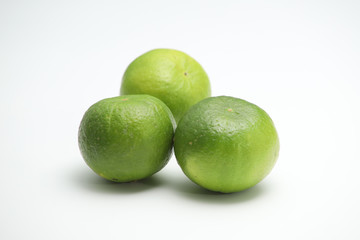 Fresh green lime isolated on white background