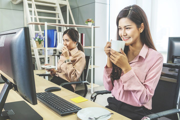 Call center, Portrait of happy smiling female customer support phone operator at workplace, Cheerful call center woman working from home talking with customer and drinking coffee