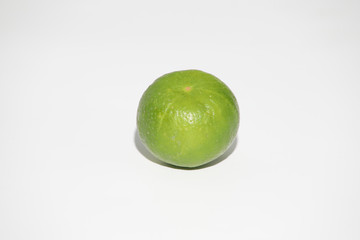 Fresh green lime isolated on white background