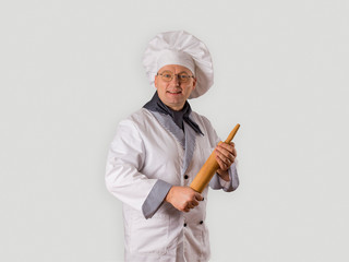 chef in uniform on a gray background. 