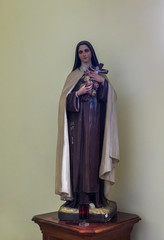 Naklejka premium The statue in interior of the Our Lady of the Ark of the Covenant Church in the Chechen village Abu Ghosh near Jerusalem in Israel