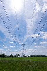 electricity pylons in field