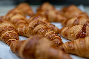 Freshly baked croissants in a pastry shop in Madrid, Spain