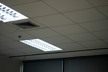 Fluorescent lamp Lights from ceiling in office