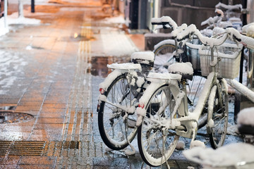 Fototapeta na wymiar Bike covered with fresh snow