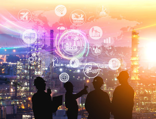 Silhouette of the engineering team is working at the oil refinery and icons connecting networking using industry concept