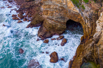 sunset at the cliffs by ocean in Luzui mountain, Shenzhen, China