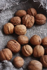 Walnuts on a grey linen background macro 