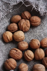 Walnuts on a grey linen background macro 