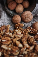 Walnuts on a grey linen background macro 
