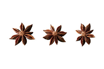Star anise in different sizes and shapes on a white background.  Composition of a star anise islated