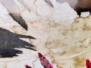 Vintage old posters sticked and torn on wall for your grunge background