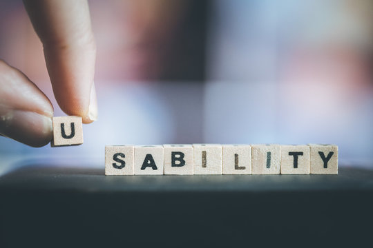 Usability concept: Close up picture of wood cubes with the word “usability”