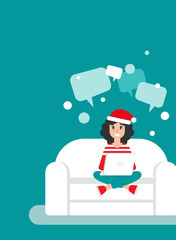 Happy freelancer girl on sofa with computer, santa hat and speech bubbles on sofa.