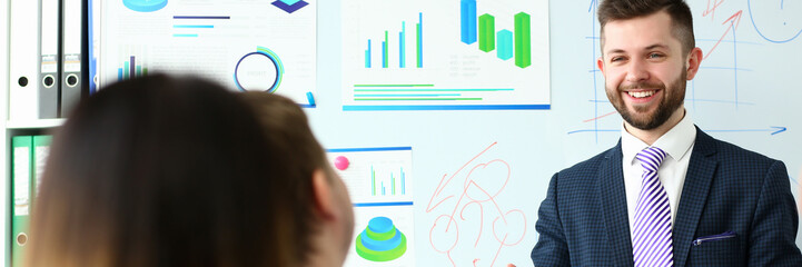 Young handsome teacher man in suit with