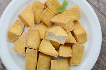 Closeup of fried tofu slices plate