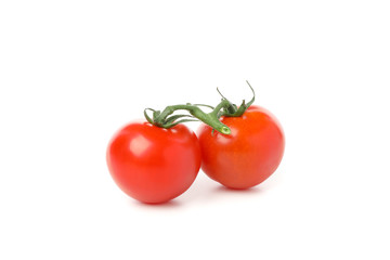 Tasty red tomatoes isolated on white background