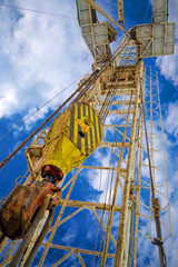 Oil and Gas Drilling Rig. Oil platform isolated on white background. Drilling rig in oil field for drilled into subsurface in order to produced crude, inside view. Petroleum Industry