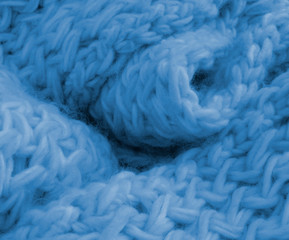 Trendy color classic blue knitting texture background. Fashion  minimalism backdrop with copy space.