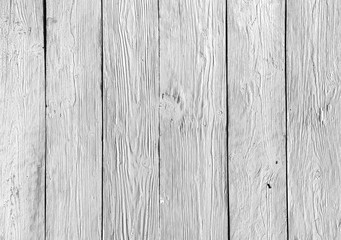 Naklejka premium White wooden wall with vertical straps and deep, embossed texture.