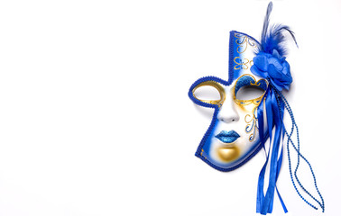 mask for Mardi Gras blue and gold on a white background © Irina