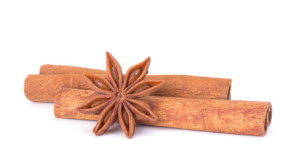 Spicy Cinnamon Sticks and Anise isolated on White background closeup macro shot
