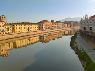 Fototapeta na wymiar Arno river embankment in Pisa