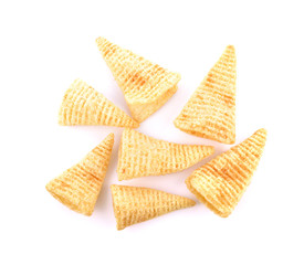 Crunchy corn snacks on a white background