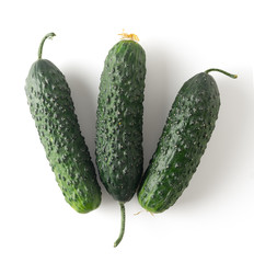 Three fresh cucumbers on white background, image