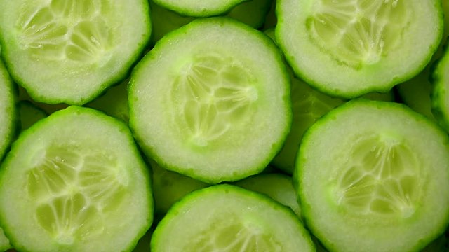 slices of cucumber spin closeup