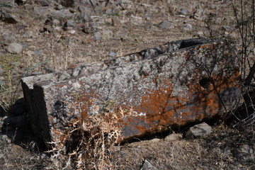ancient basalt washbasin. ancient basalt washbasin on a mountain landscape. autumn mountain...