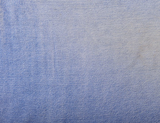Fototapeta na wymiar Texture of blue jeans textile