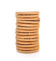 Sandwich cookie filled with chocolate cream on white