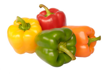 Four bell peppers isolated on white background