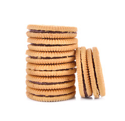 Sandwich cookie filled with chocolate cream on white