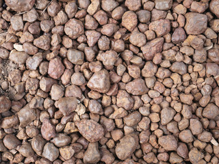 Texture of brown pebbles stone  from waterfall.