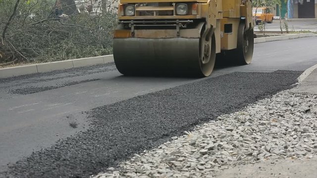 Workers During Asphalting