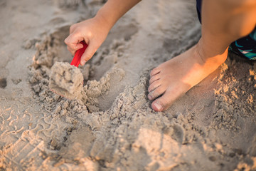 Child and sand