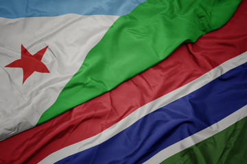 waving colorful flag of gambia and national flag of djibouti.