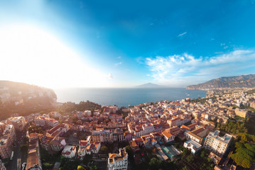 Beautiful panoramic aerial view on the center of Sorrento city, sunset, houses and streets, sea...