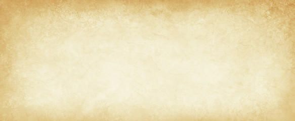 old brown parchment paper background with yellowed vintage grunge texture borders and off white light center with distressed faded antique colors